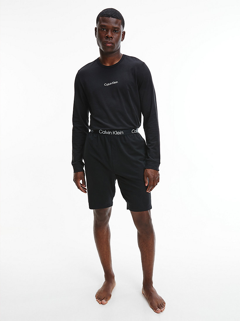 Pánské tričko s dlouhým rukávem model 16235246 UB1 Černá - Calvin Klein Velikost: M, Barvy: černá