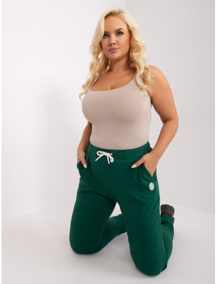 Tmavě zelené tepláky plus size velikosti