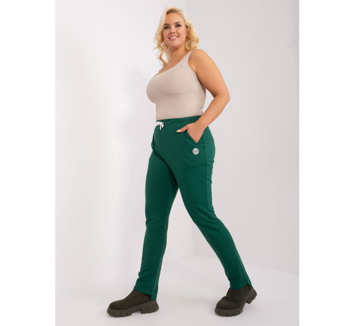 Tmavě zelené tepláky plus size velikosti